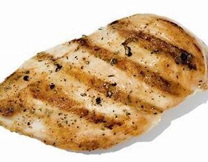 Grilled chicken breast on white background.